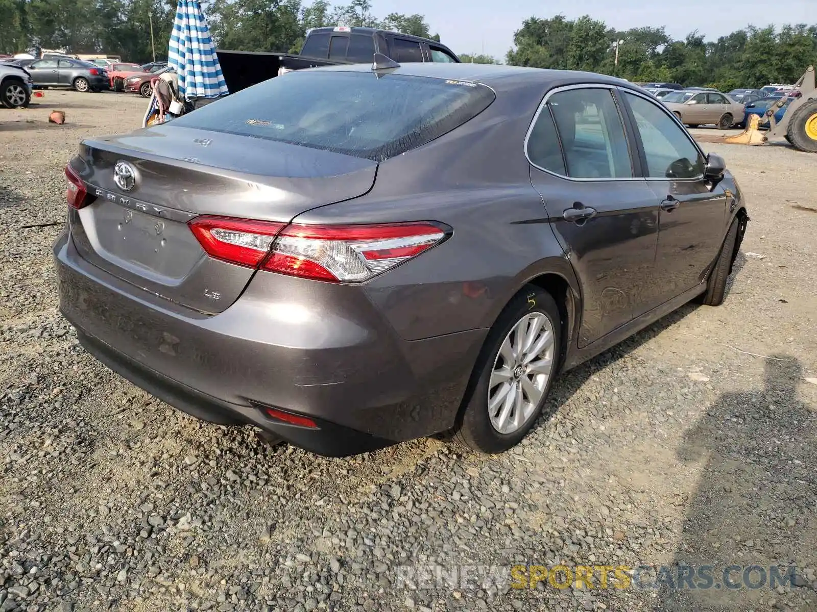 4 Photograph of a damaged car 4T1B11HK5KU261925 TOYOTA CAMRY 2019