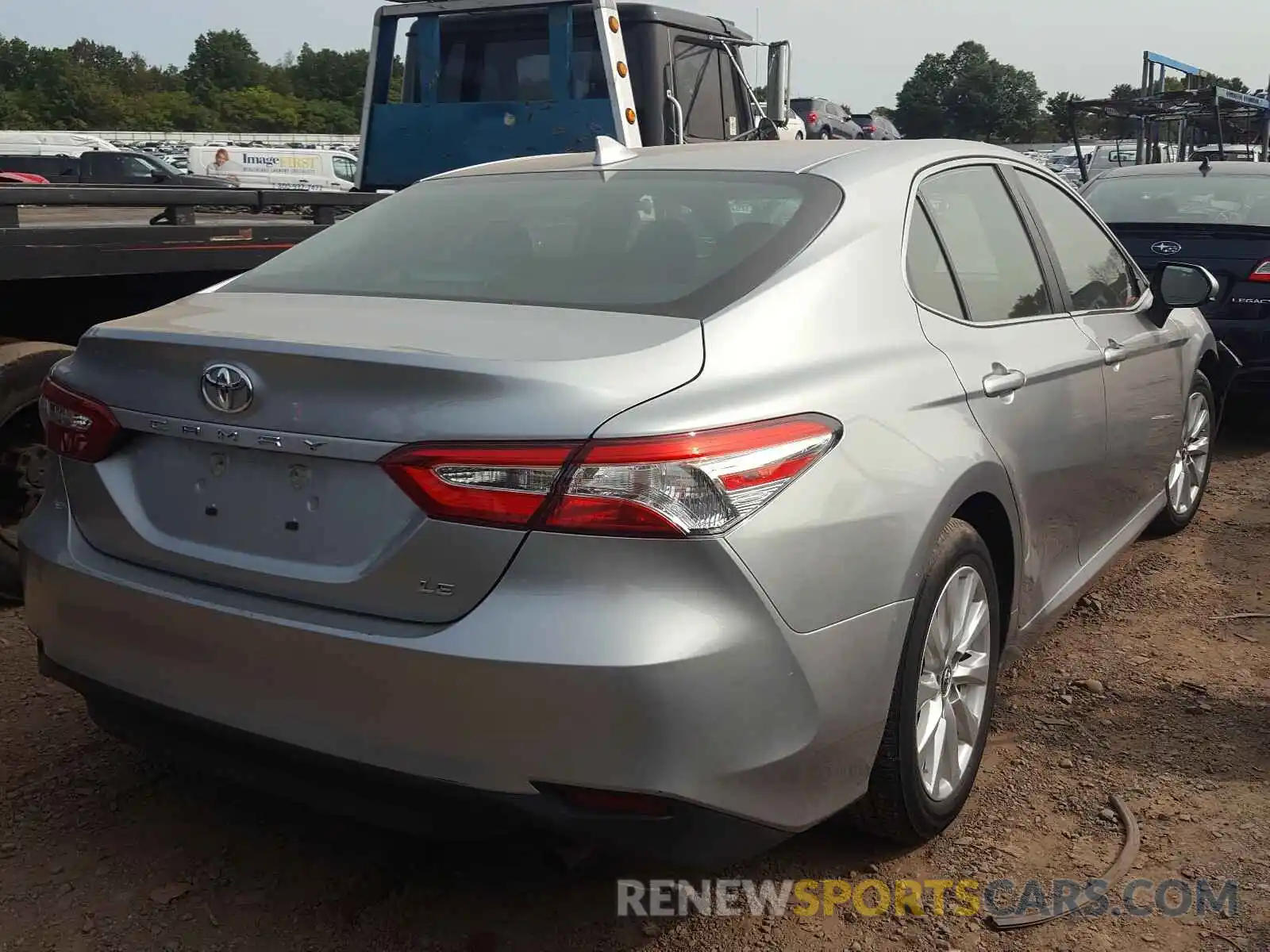 4 Photograph of a damaged car 4T1B11HK5KU268311 TOYOTA CAMRY 2019