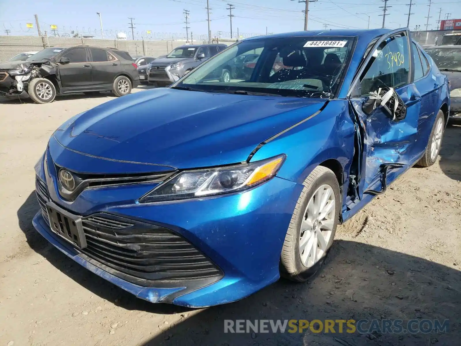 2 Photograph of a damaged car 4T1B11HK5KU269104 TOYOTA CAMRY 2019