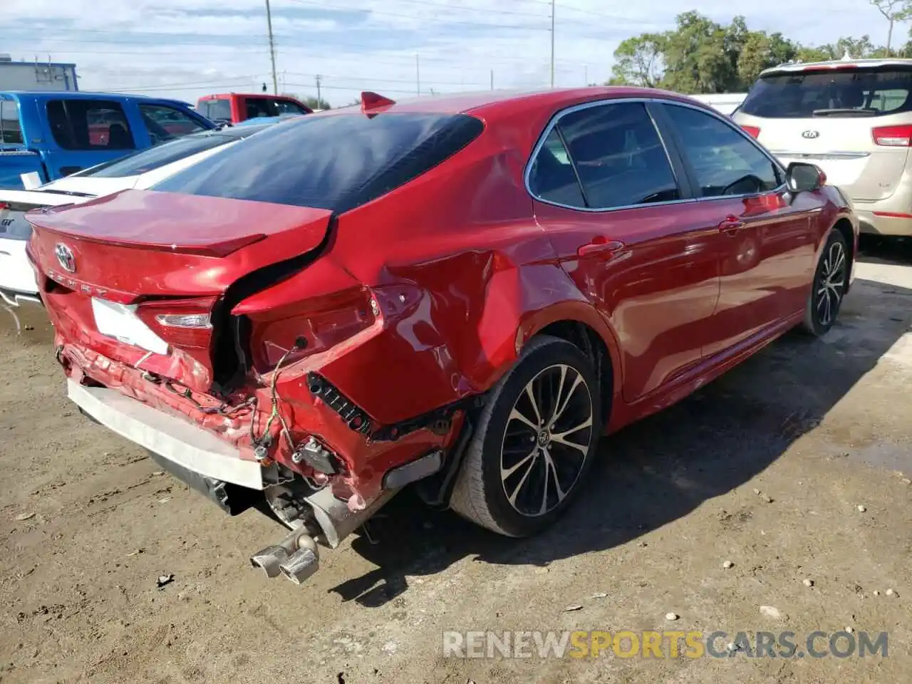 4 Photograph of a damaged car 4T1B11HK5KU270270 TOYOTA CAMRY 2019