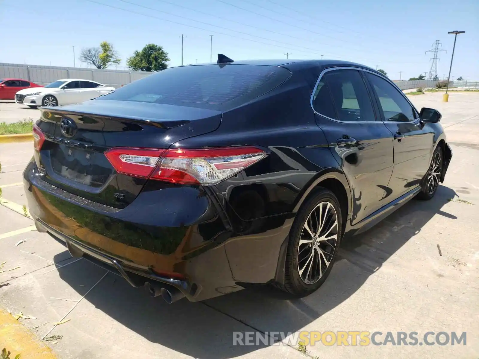 4 Photograph of a damaged car 4T1B11HK5KU280023 TOYOTA CAMRY 2019