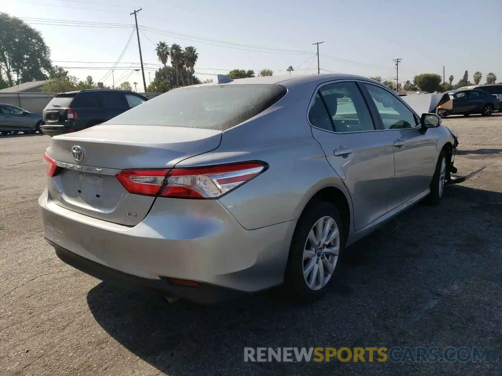 4 Photograph of a damaged car 4T1B11HK5KU284248 TOYOTA CAMRY 2019