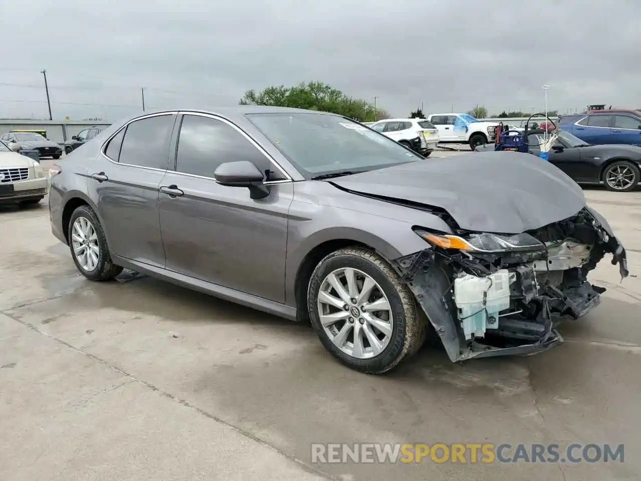 4 Photograph of a damaged car 4T1B11HK5KU286503 TOYOTA CAMRY 2019