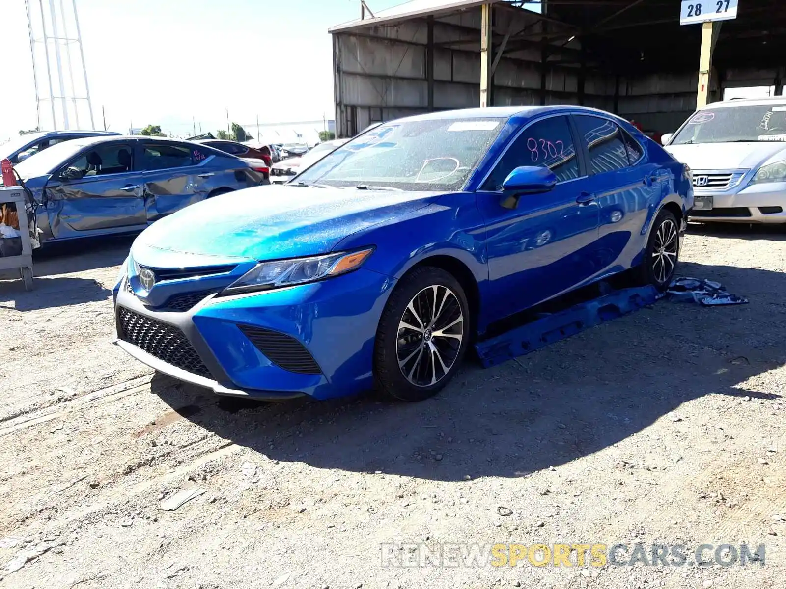 2 Photograph of a damaged car 4T1B11HK5KU286596 TOYOTA CAMRY 2019