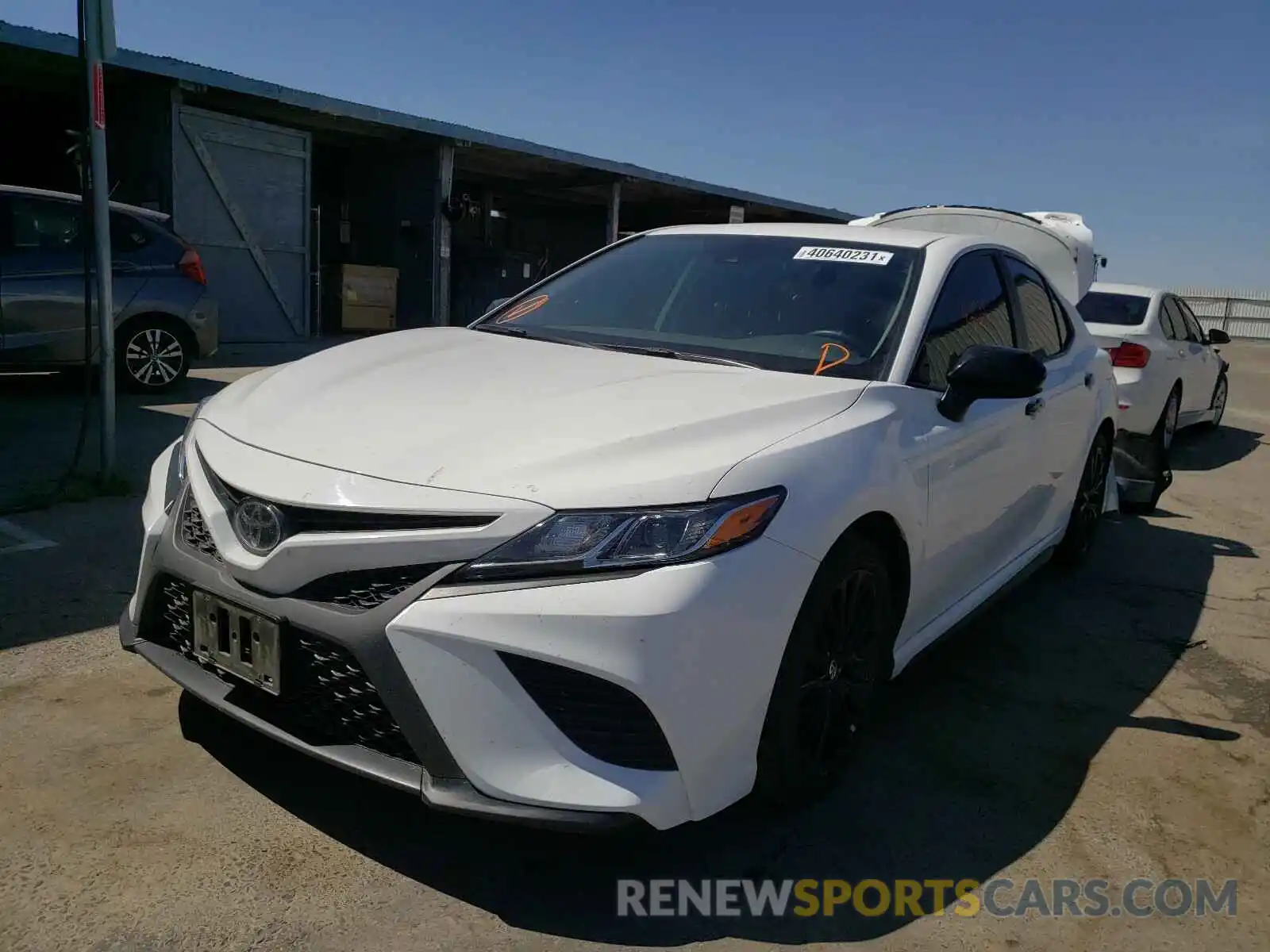 2 Photograph of a damaged car 4T1B11HK5KU289952 TOYOTA CAMRY 2019