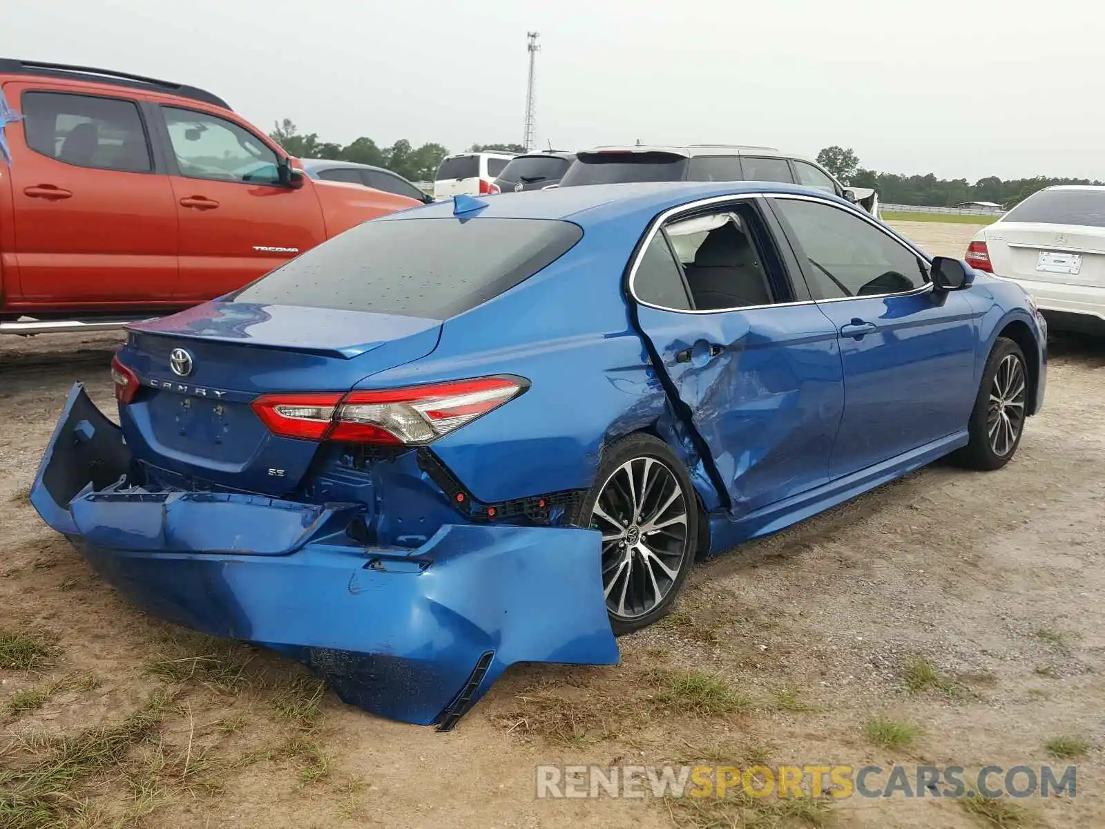 4 Photograph of a damaged car 4T1B11HK5KU298912 TOYOTA CAMRY 2019