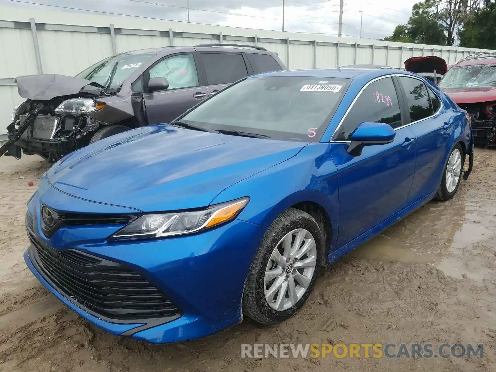 2 Photograph of a damaged car 4T1B11HK5KU299610 TOYOTA CAMRY 2019