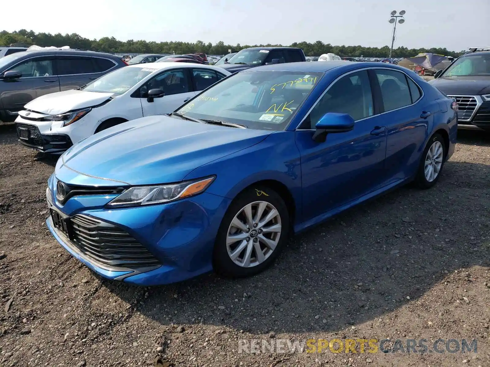 2 Photograph of a damaged car 4T1B11HK5KU299865 TOYOTA CAMRY 2019