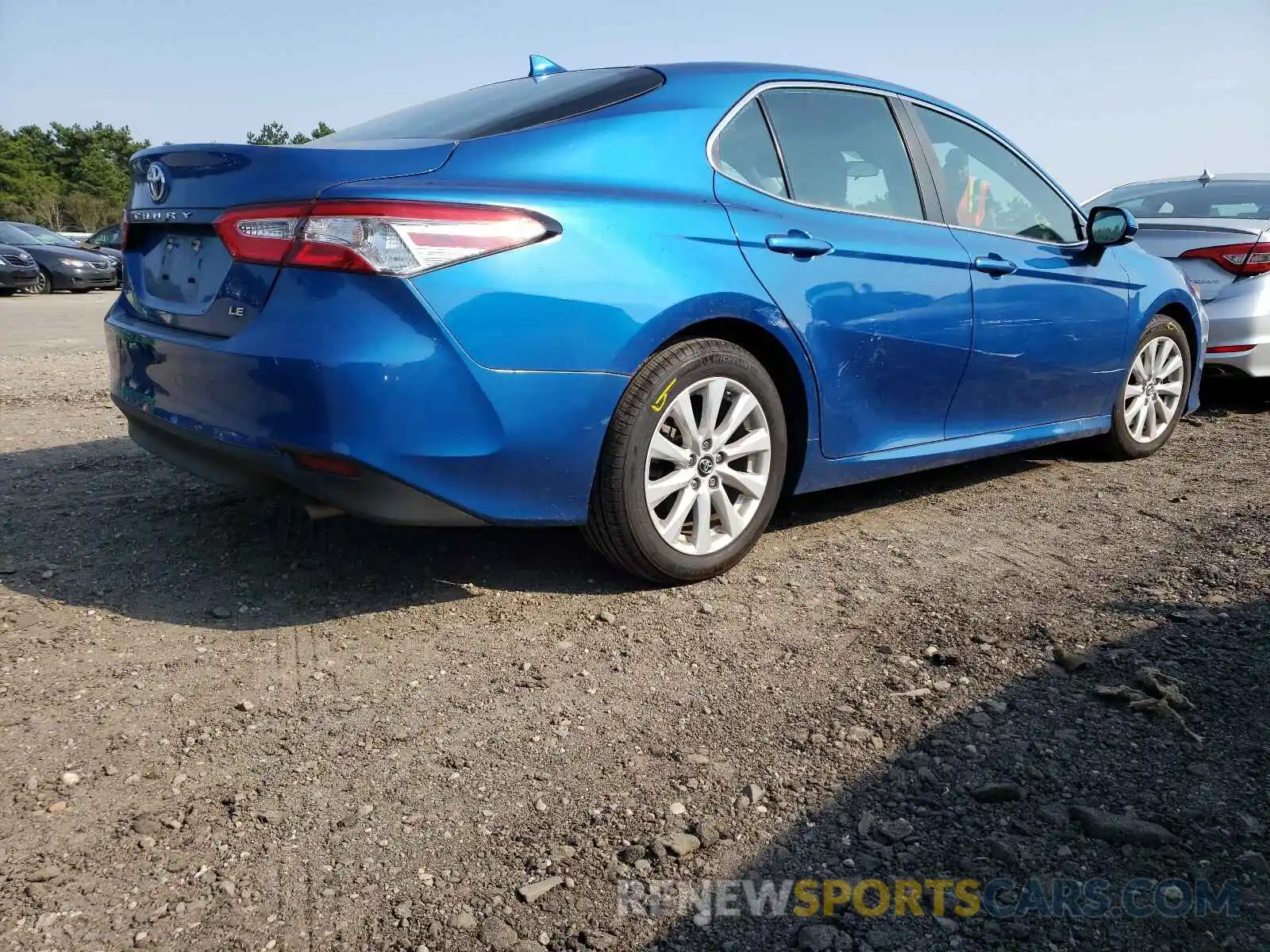 4 Photograph of a damaged car 4T1B11HK5KU299865 TOYOTA CAMRY 2019