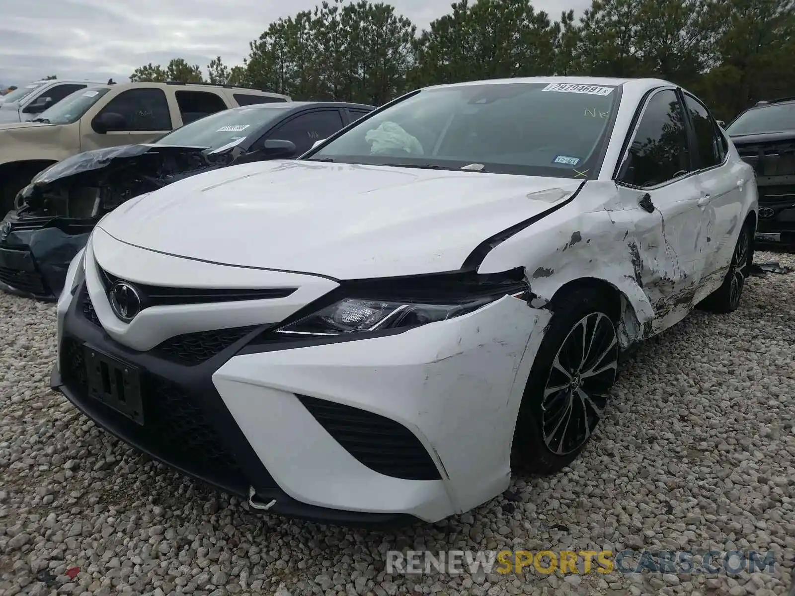 2 Photograph of a damaged car 4T1B11HK5KU679157 TOYOTA CAMRY 2019