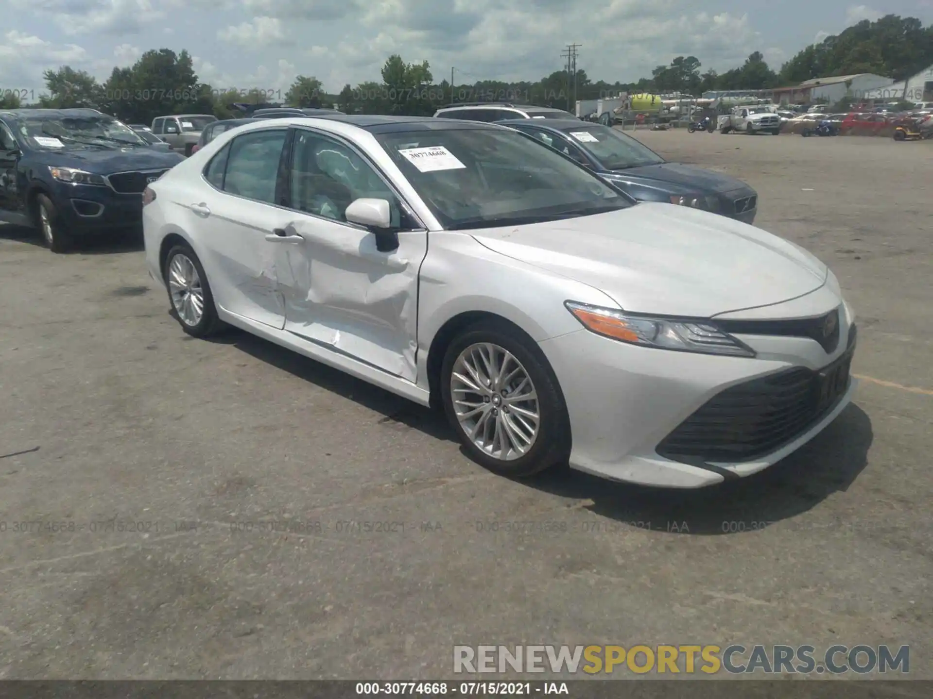 1 Photograph of a damaged car 4T1B11HK5KU679384 TOYOTA CAMRY 2019