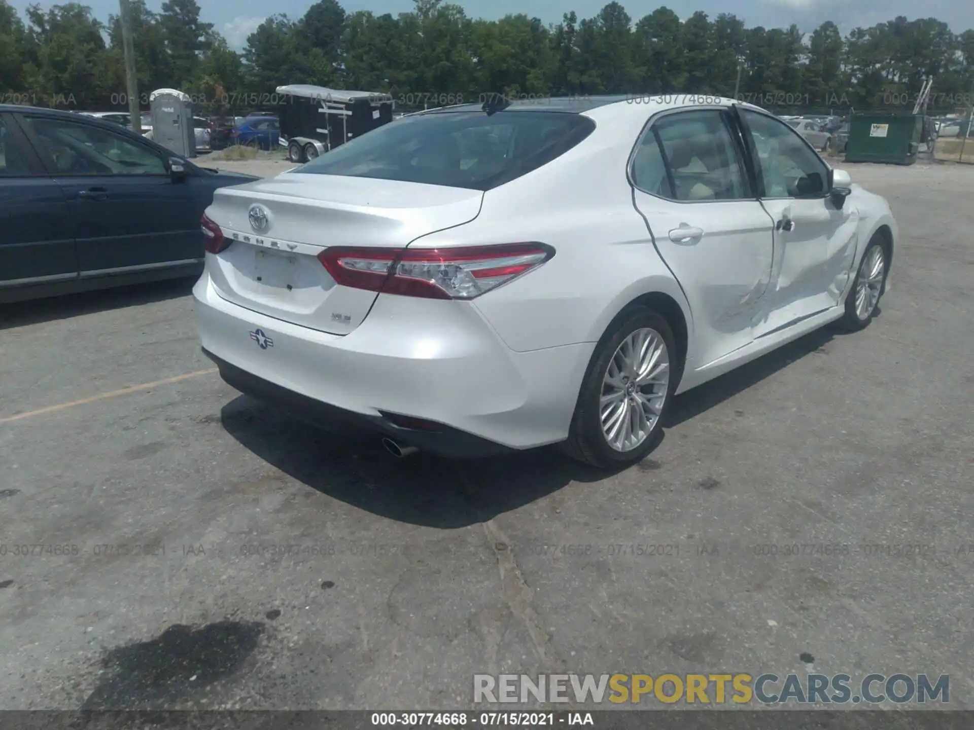 4 Photograph of a damaged car 4T1B11HK5KU679384 TOYOTA CAMRY 2019