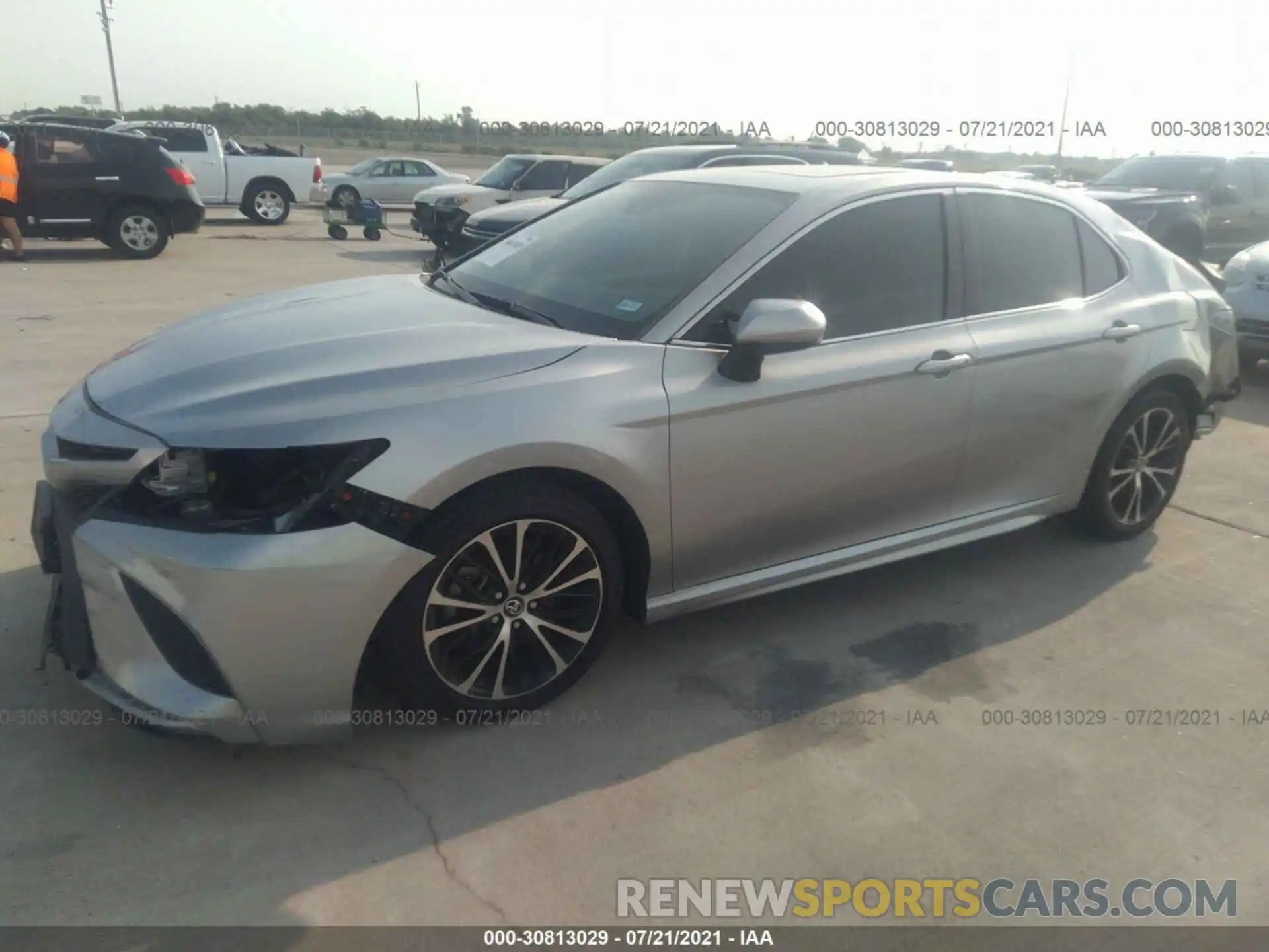 2 Photograph of a damaged car 4T1B11HK5KU680664 TOYOTA CAMRY 2019