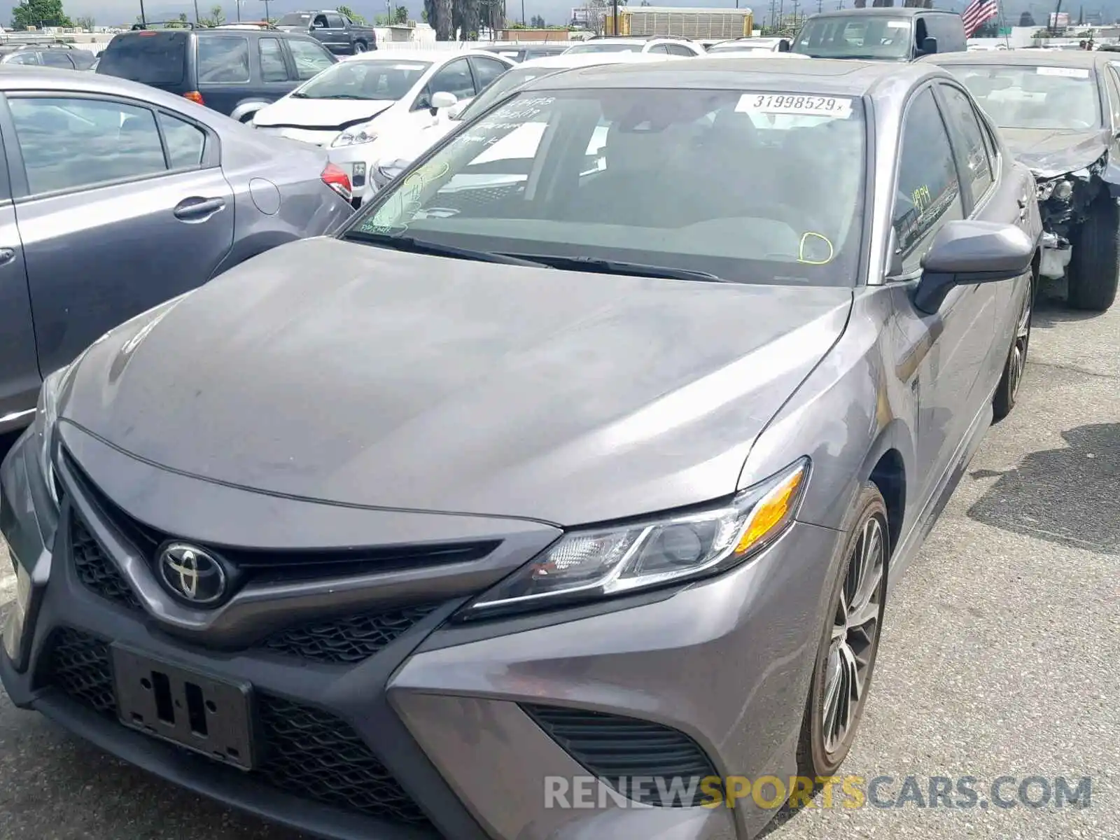 2 Photograph of a damaged car 4T1B11HK5KU681975 TOYOTA CAMRY 2019