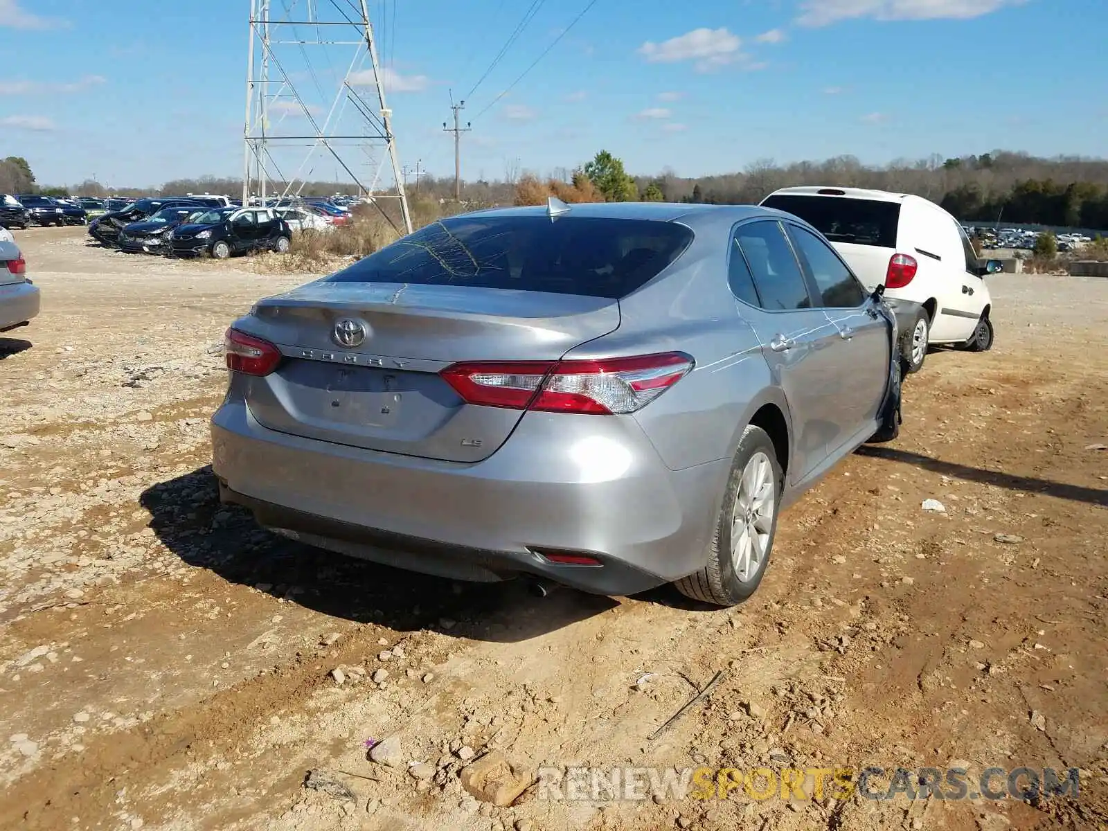 4 Photograph of a damaged car 4T1B11HK5KU686058 TOYOTA CAMRY 2019