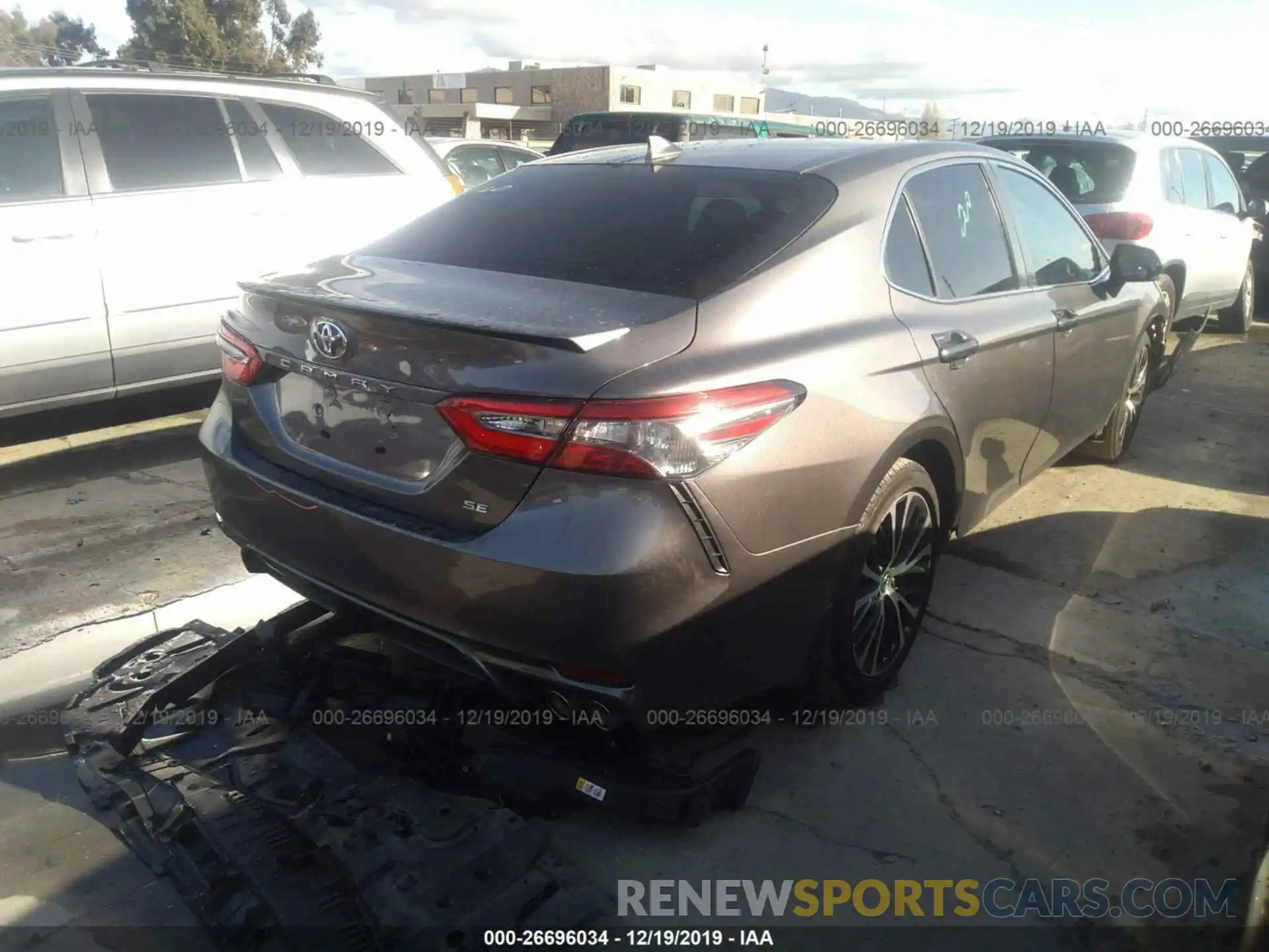 4 Photograph of a damaged car 4T1B11HK5KU687131 TOYOTA CAMRY 2019