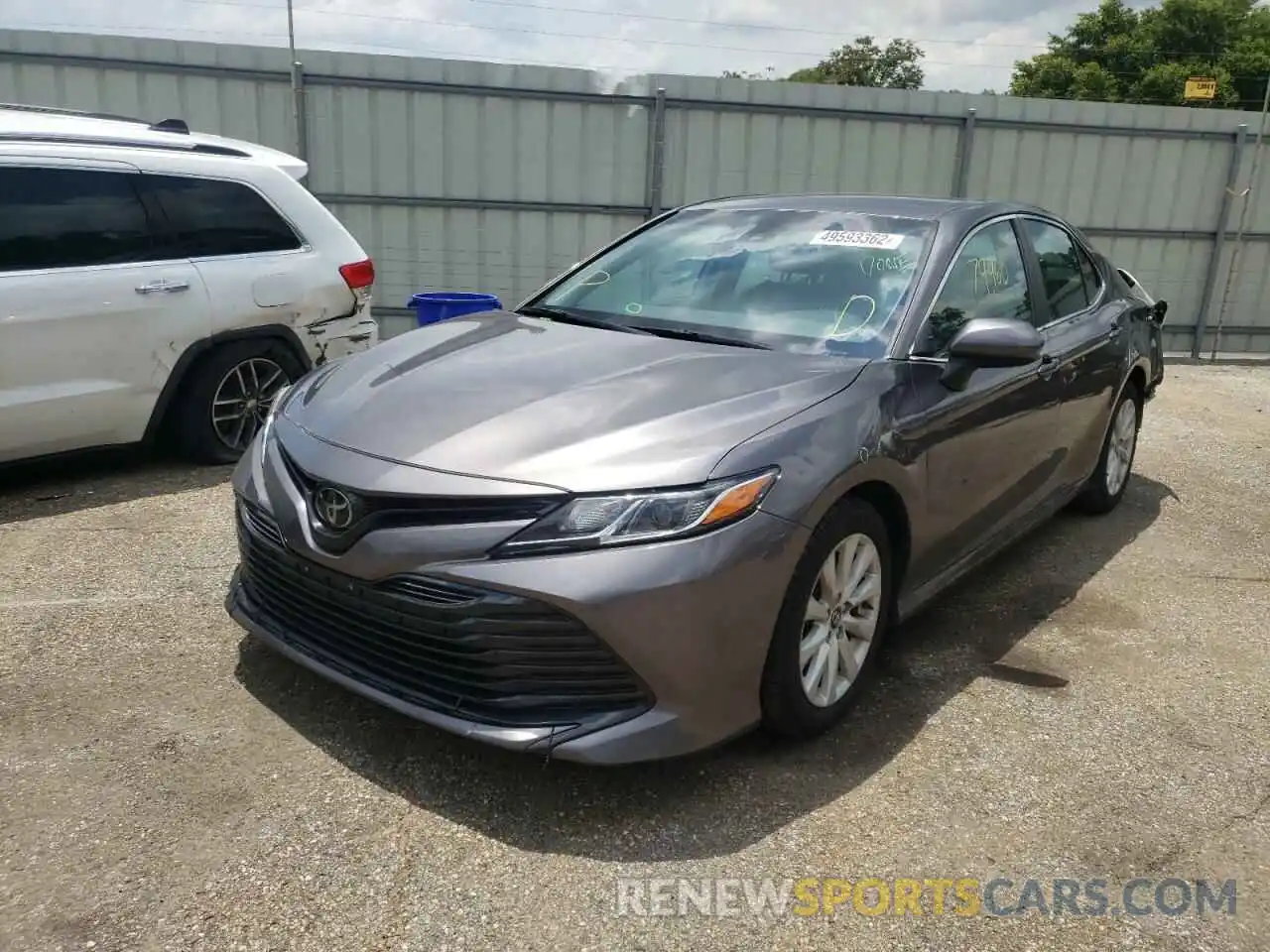 2 Photograph of a damaged car 4T1B11HK5KU687887 TOYOTA CAMRY 2019