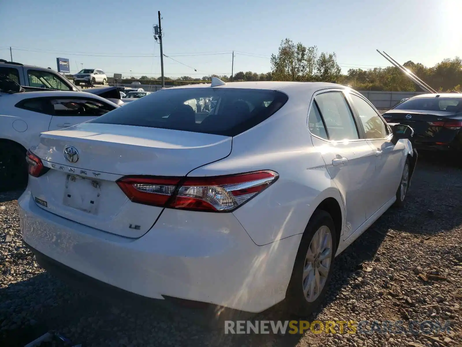 4 Photograph of a damaged car 4T1B11HK5KU690238 TOYOTA CAMRY 2019