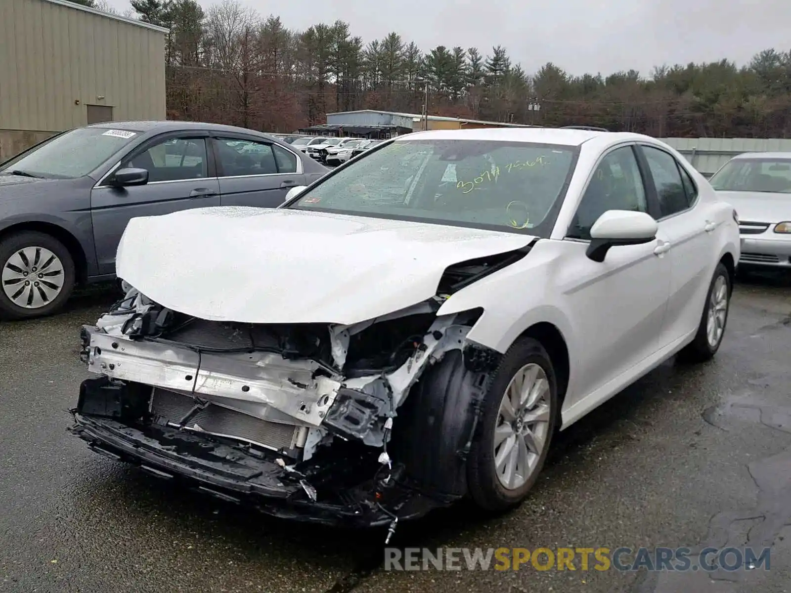 2 Photograph of a damaged car 4T1B11HK5KU694077 TOYOTA CAMRY 2019