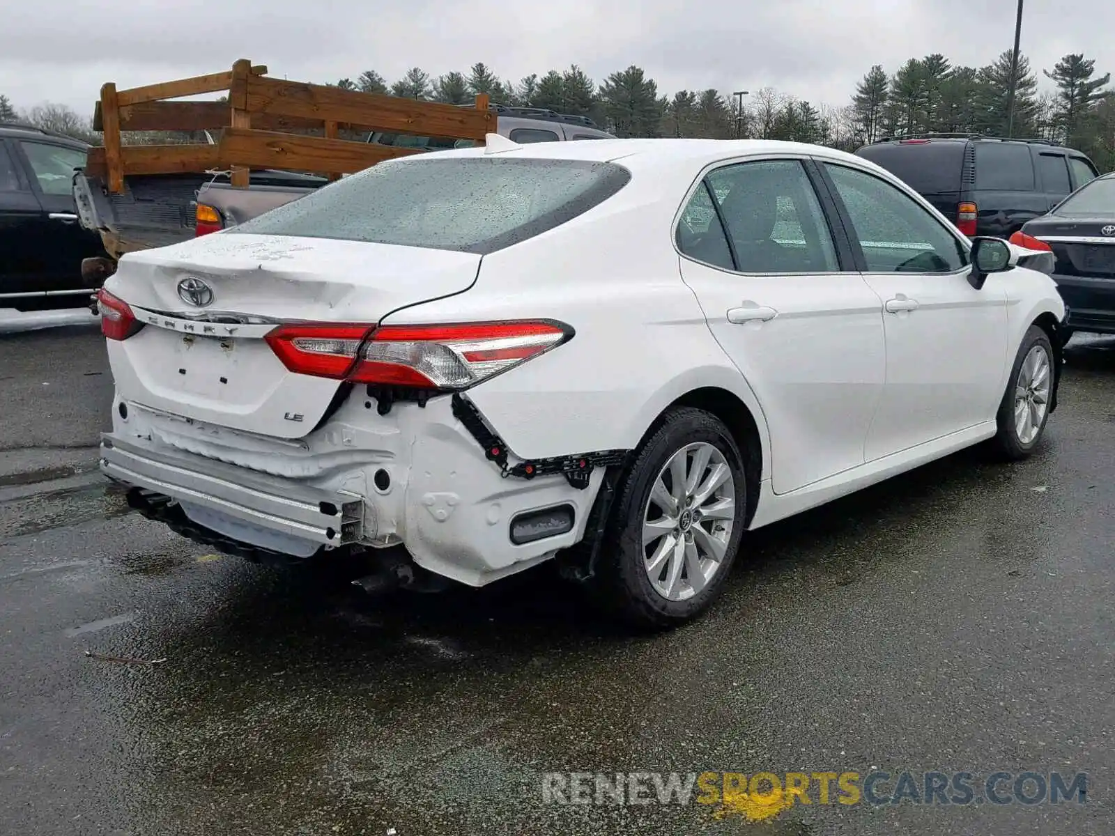 4 Photograph of a damaged car 4T1B11HK5KU694077 TOYOTA CAMRY 2019