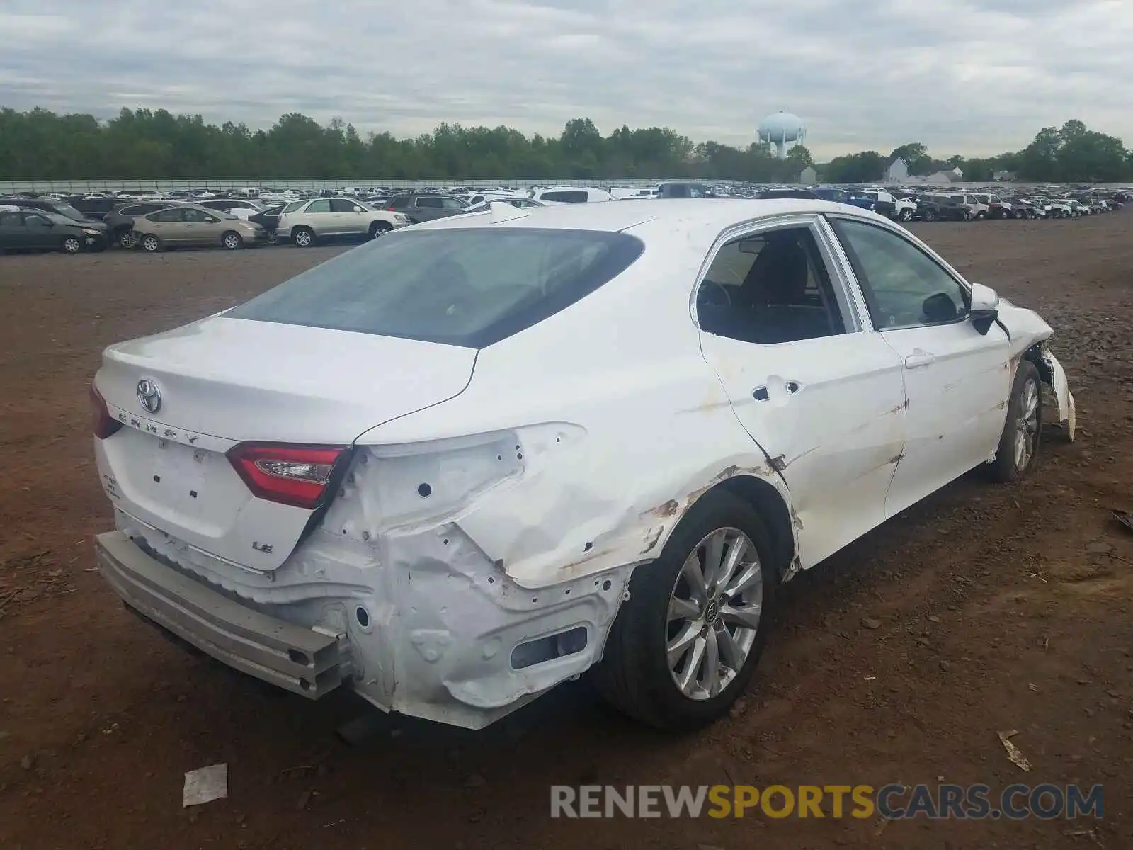 4 Photograph of a damaged car 4T1B11HK5KU696203 TOYOTA CAMRY 2019