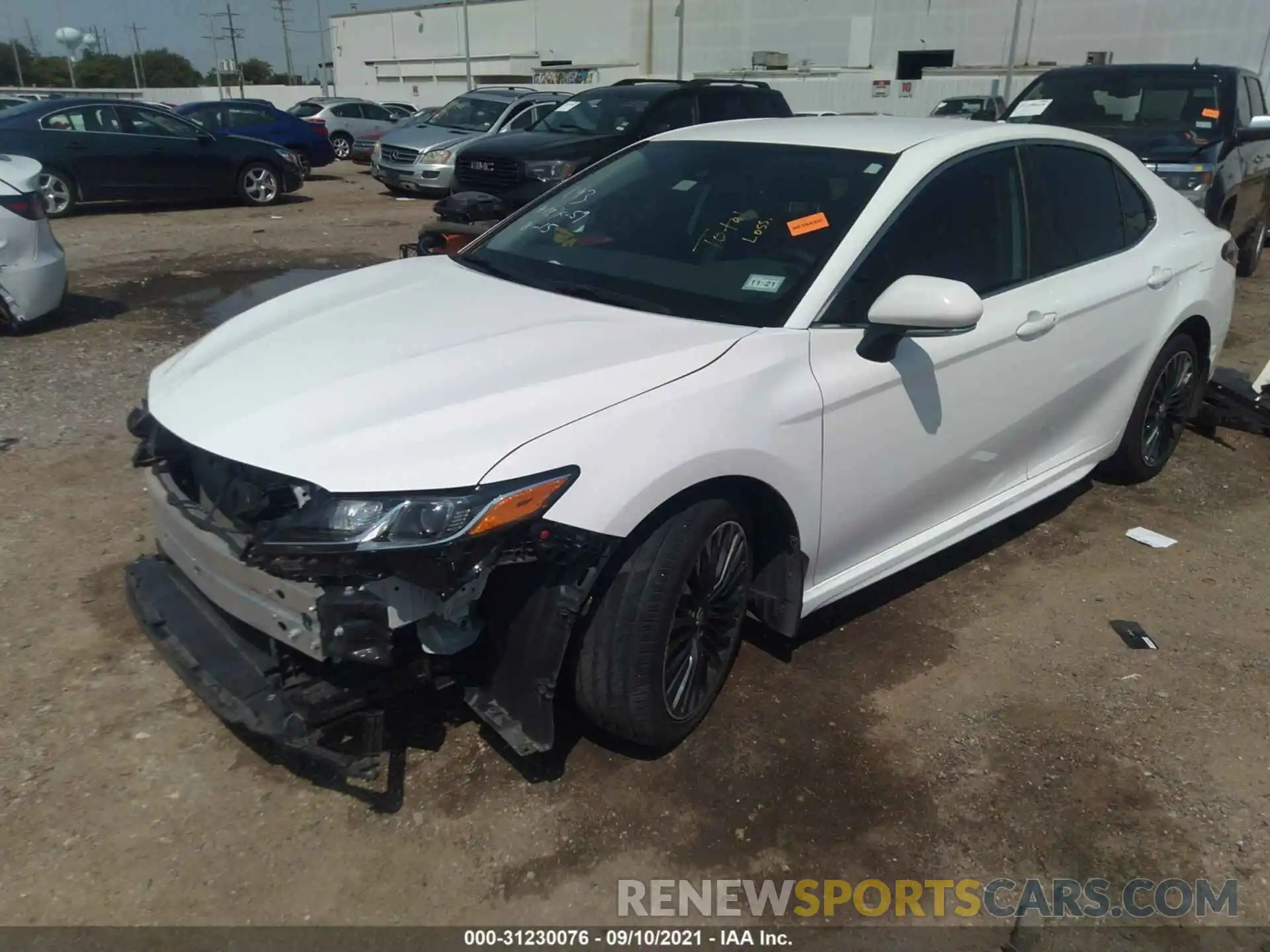 2 Photograph of a damaged car 4T1B11HK5KU696749 TOYOTA CAMRY 2019