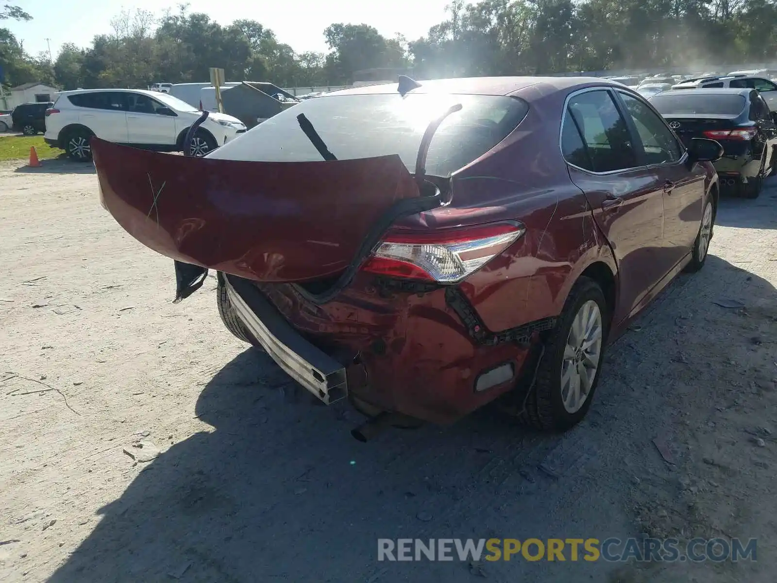 4 Photograph of a damaged car 4T1B11HK5KU698081 TOYOTA CAMRY 2019