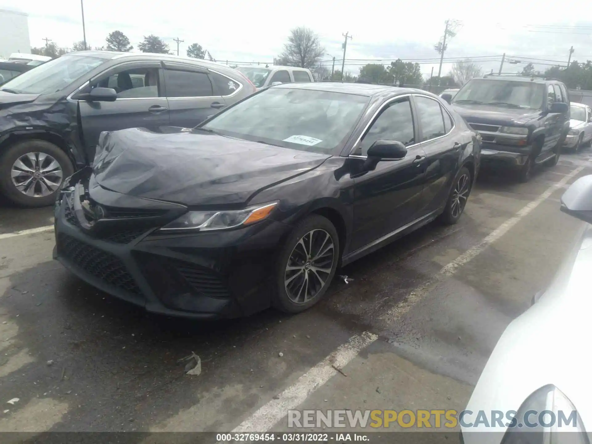 2 Photograph of a damaged car 4T1B11HK5KU698615 TOYOTA CAMRY 2019