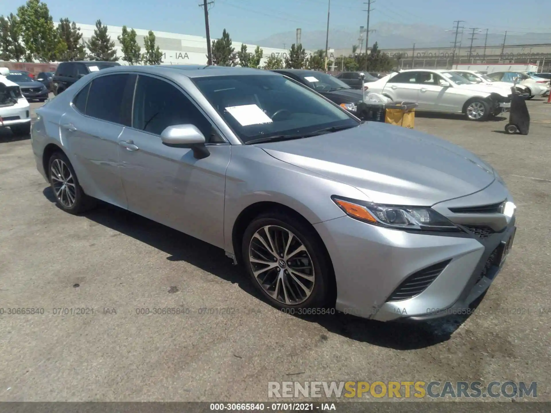 1 Photograph of a damaged car 4T1B11HK5KU699943 TOYOTA CAMRY 2019