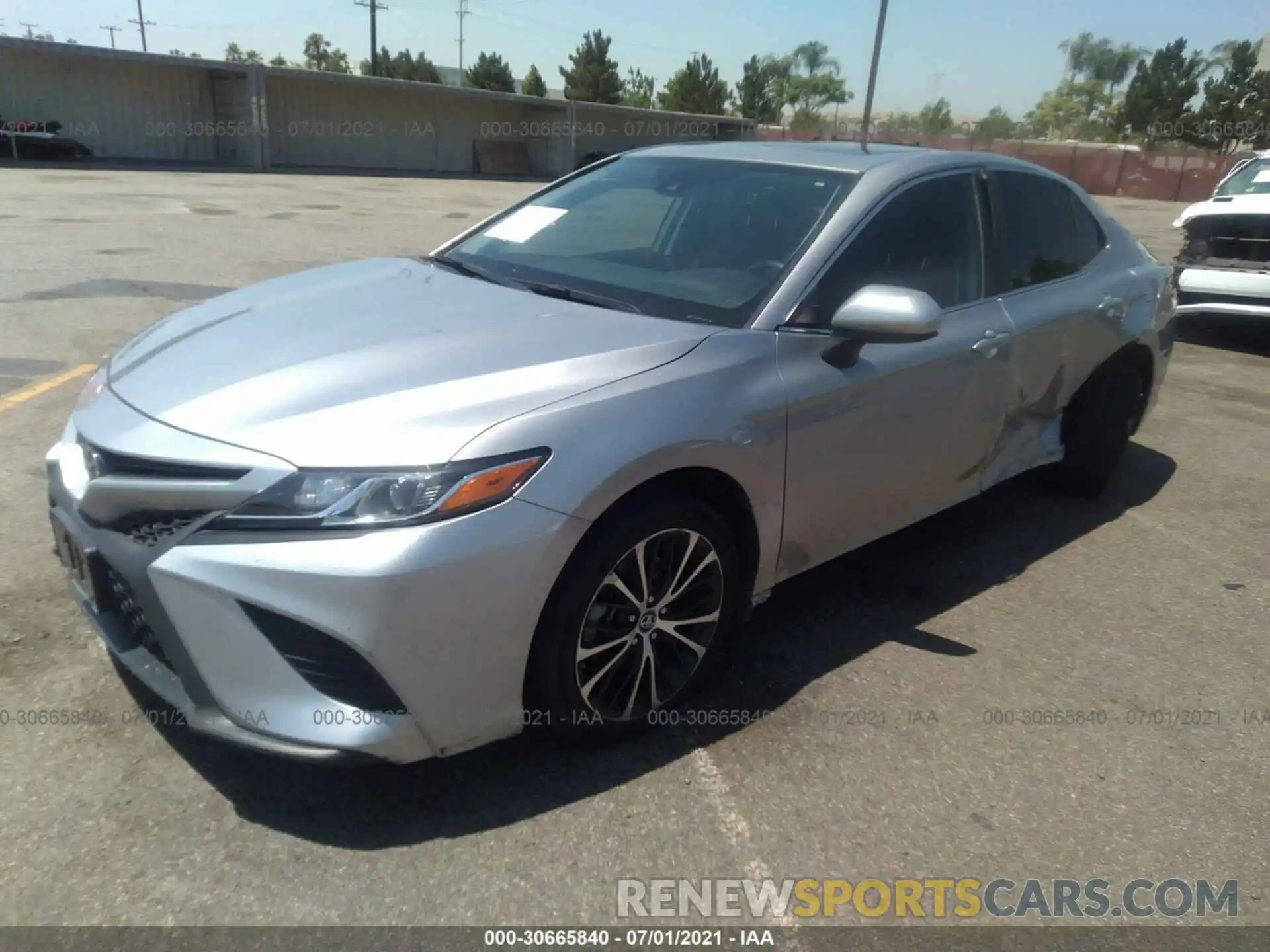 2 Photograph of a damaged car 4T1B11HK5KU699943 TOYOTA CAMRY 2019