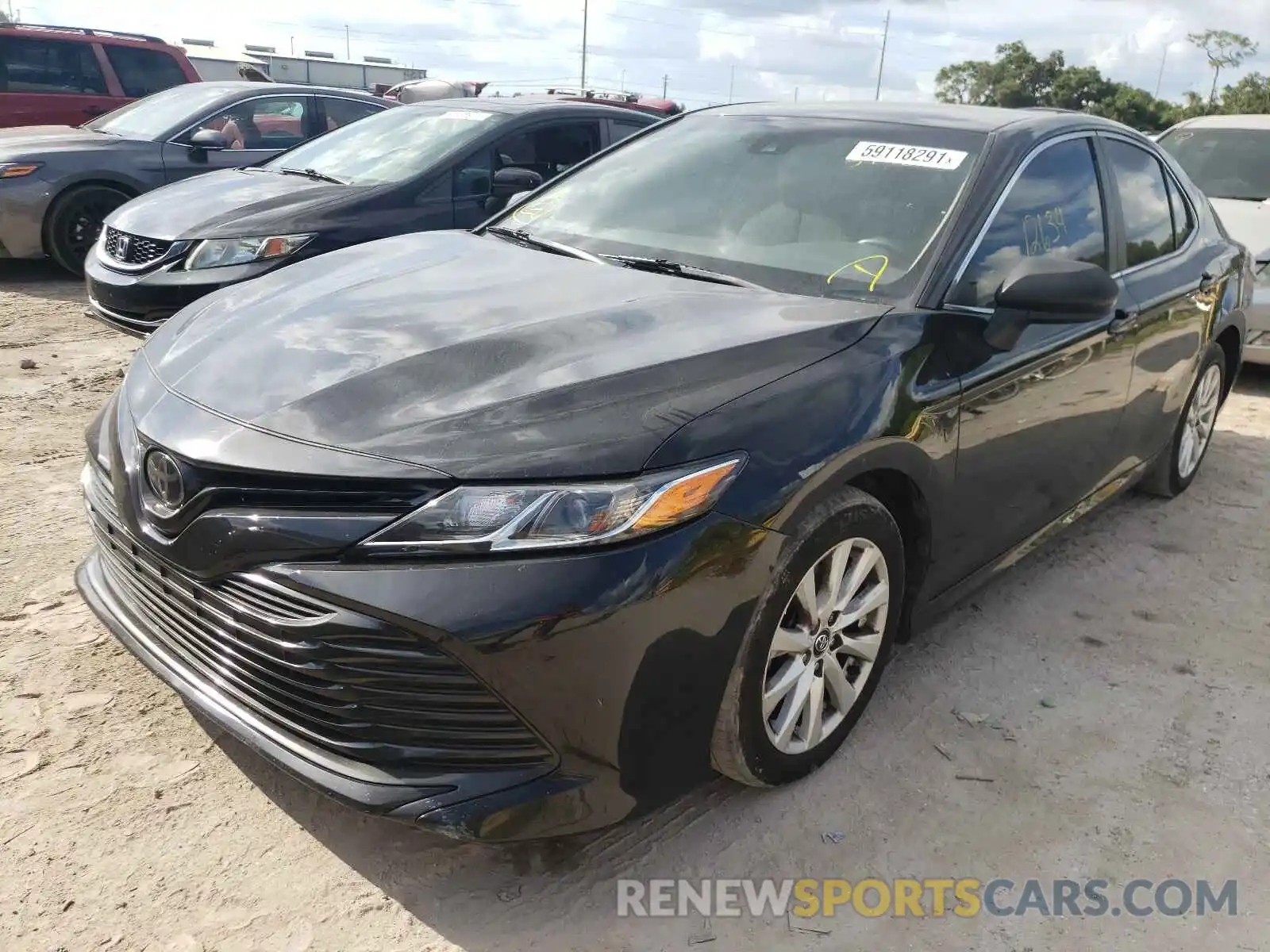 2 Photograph of a damaged car 4T1B11HK5KU700279 TOYOTA CAMRY 2019