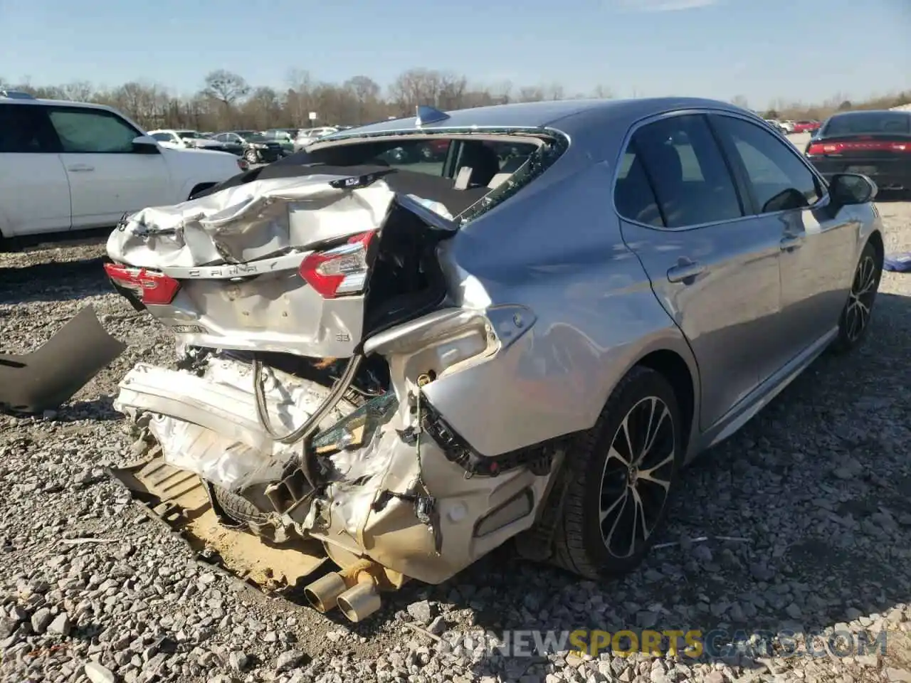 4 Photograph of a damaged car 4T1B11HK5KU701027 TOYOTA CAMRY 2019