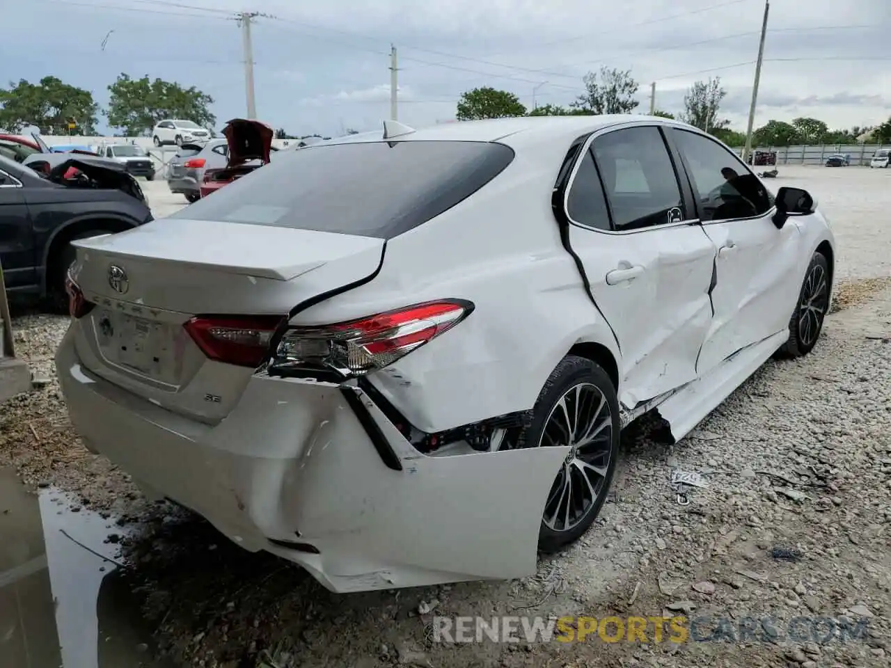 4 Photograph of a damaged car 4T1B11HK5KU701951 TOYOTA CAMRY 2019