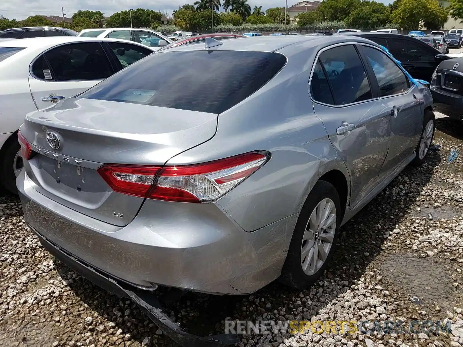 4 Photograph of a damaged car 4T1B11HK5KU703585 TOYOTA CAMRY 2019