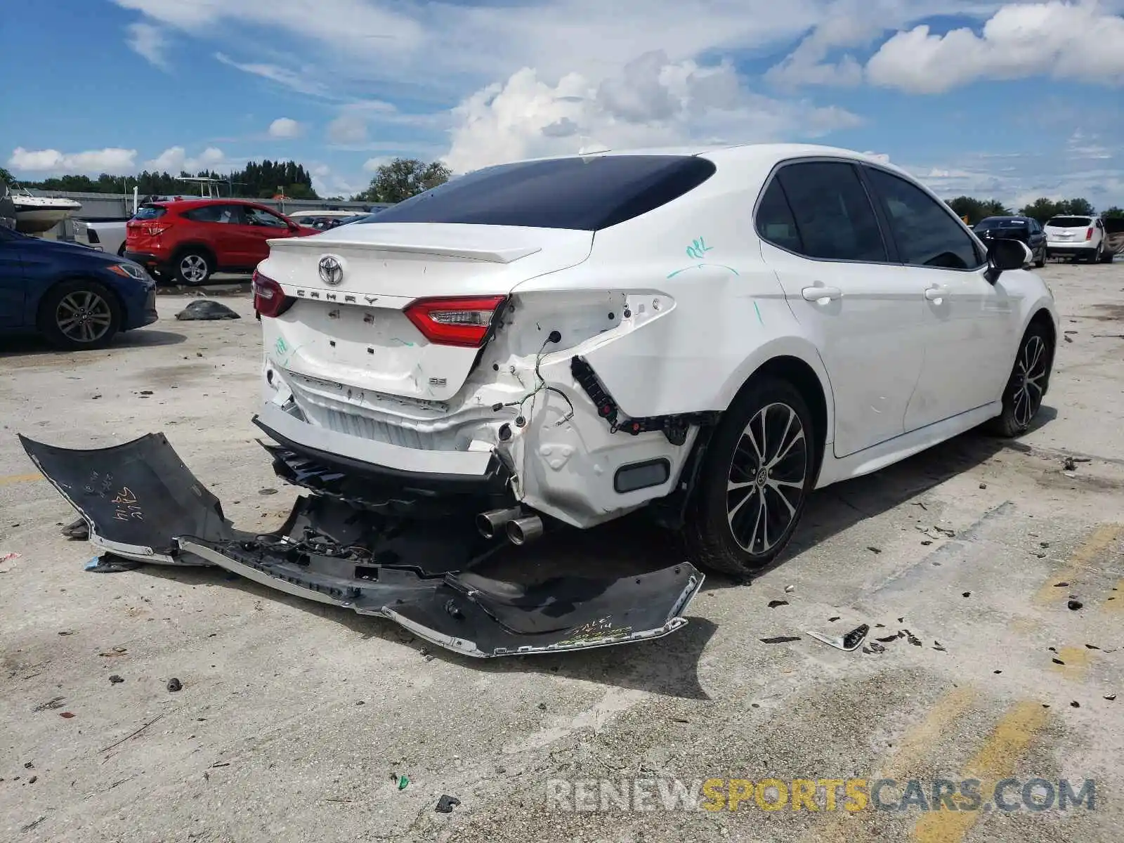 4 Photograph of a damaged car 4T1B11HK5KU704042 TOYOTA CAMRY 2019