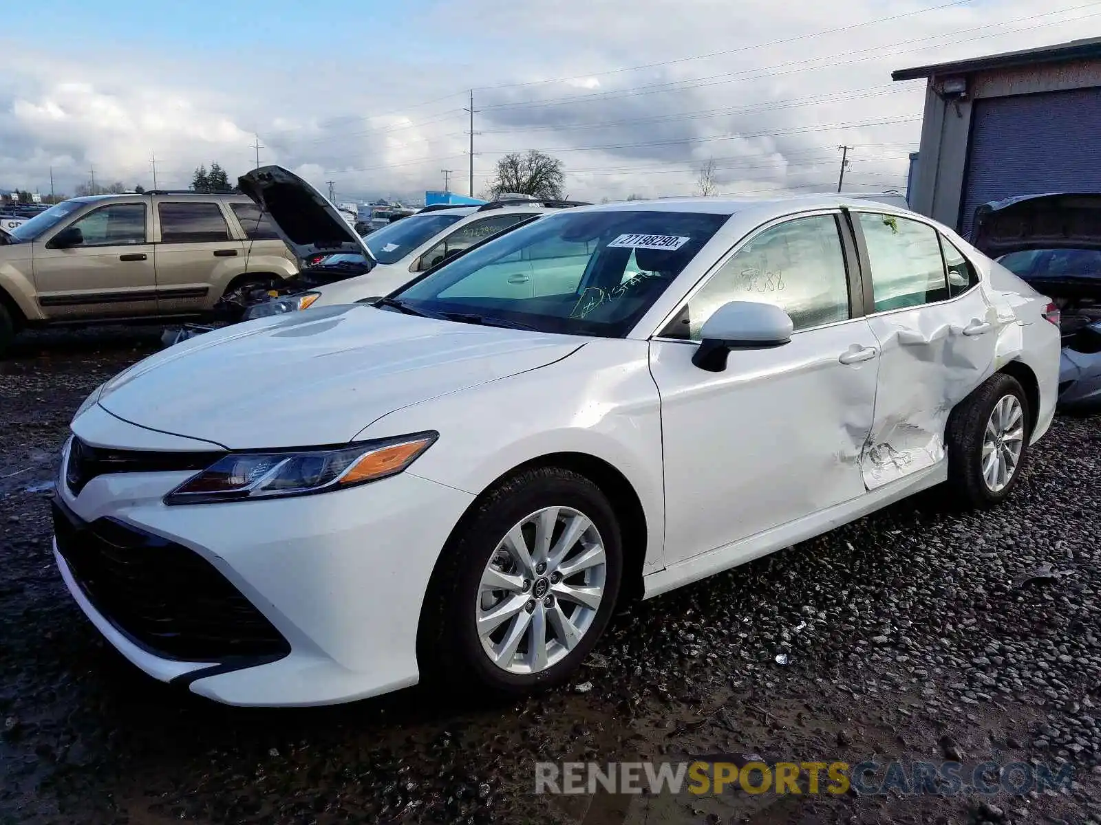 2 Photograph of a damaged car 4T1B11HK5KU708060 TOYOTA CAMRY 2019