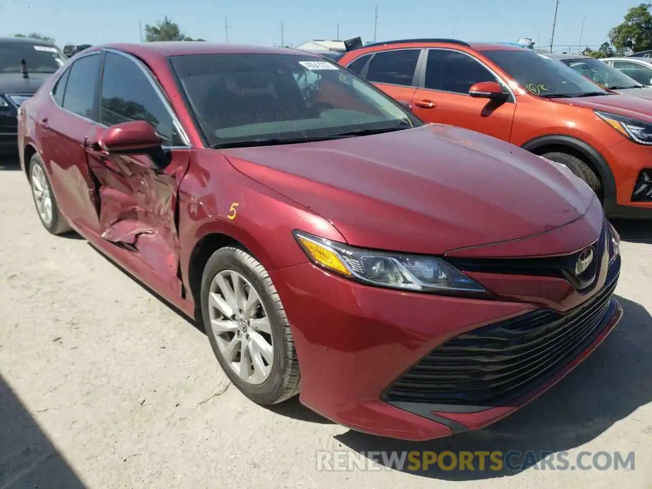 1 Photograph of a damaged car 4T1B11HK5KU708396 TOYOTA CAMRY 2019