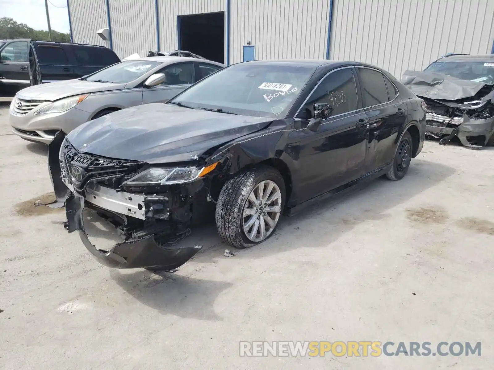 2 Photograph of a damaged car 4T1B11HK5KU709595 TOYOTA CAMRY 2019