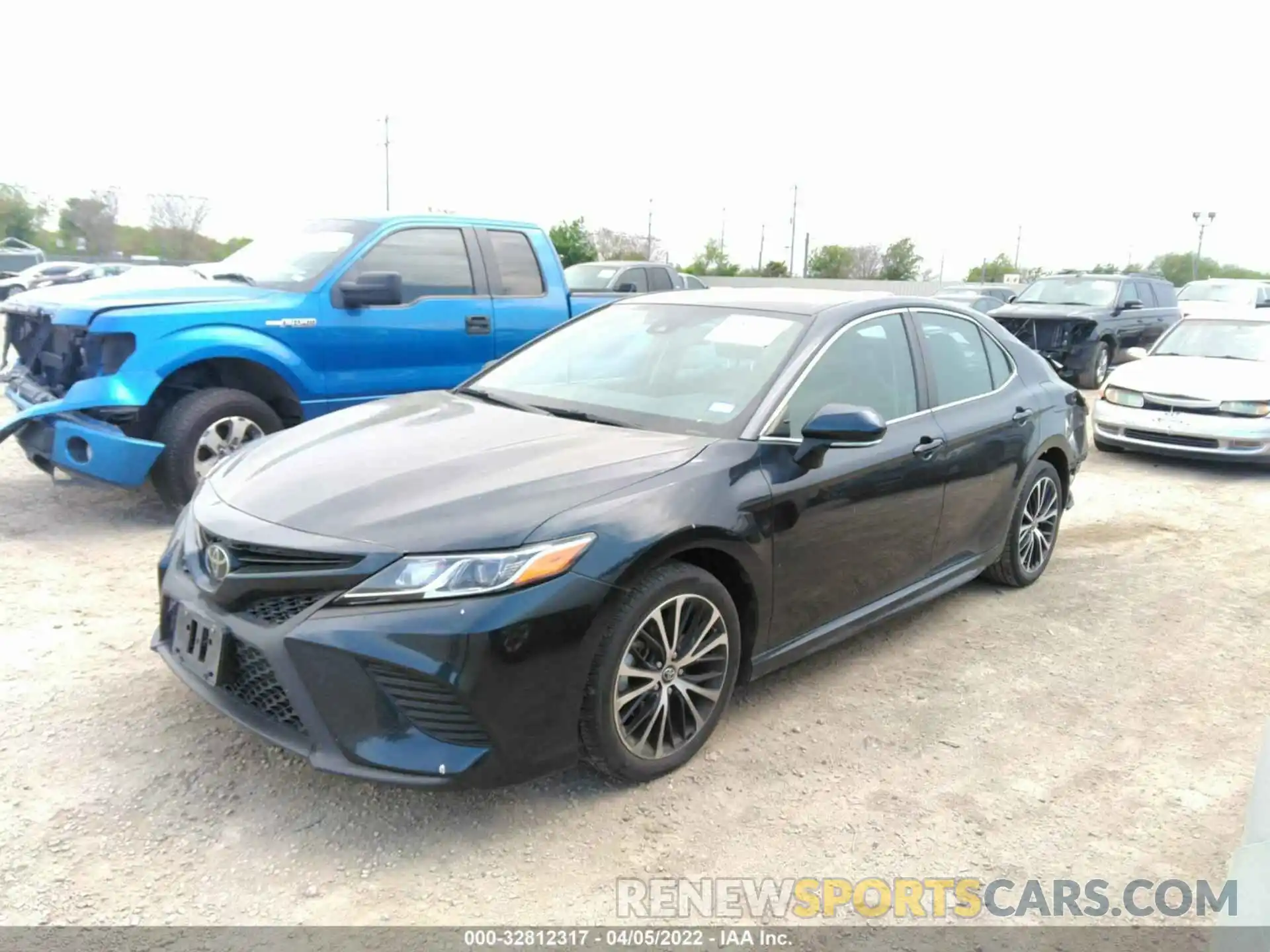 2 Photograph of a damaged car 4T1B11HK5KU710424 TOYOTA CAMRY 2019