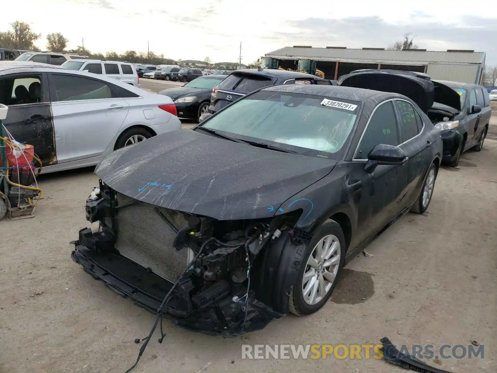 2 Photograph of a damaged car 4T1B11HK5KU710438 TOYOTA CAMRY 2019