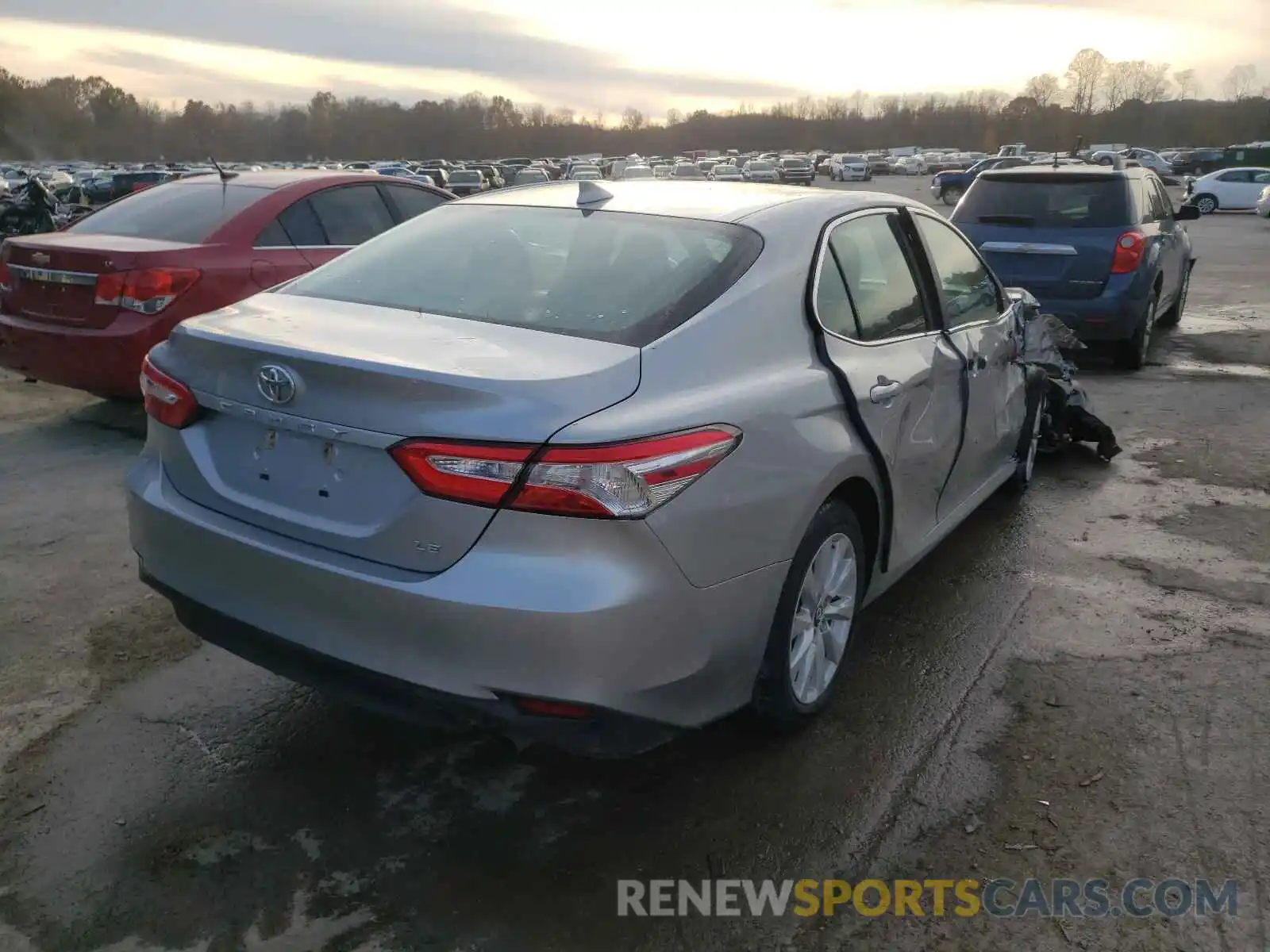 4 Photograph of a damaged car 4T1B11HK5KU713582 TOYOTA CAMRY 2019