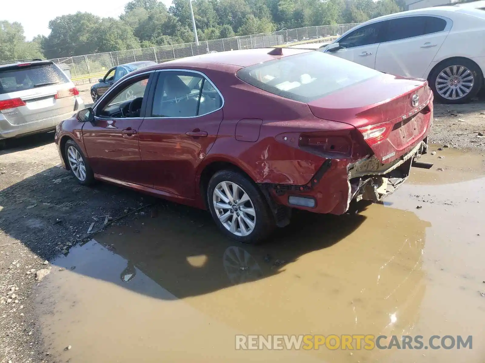 3 Photograph of a damaged car 4T1B11HK5KU714120 TOYOTA CAMRY 2019