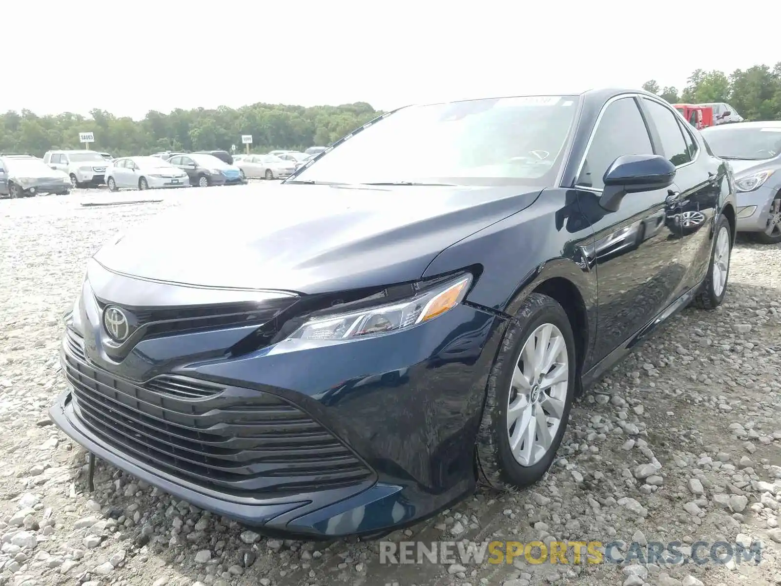 2 Photograph of a damaged car 4T1B11HK5KU715543 TOYOTA CAMRY 2019