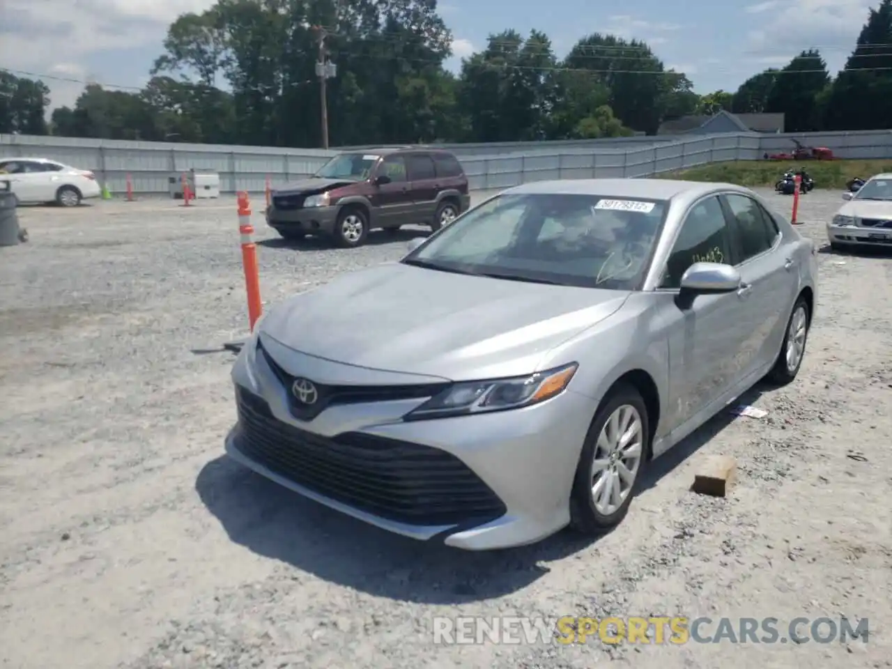 2 Photograph of a damaged car 4T1B11HK5KU715607 TOYOTA CAMRY 2019