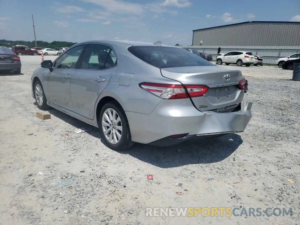 3 Photograph of a damaged car 4T1B11HK5KU715607 TOYOTA CAMRY 2019