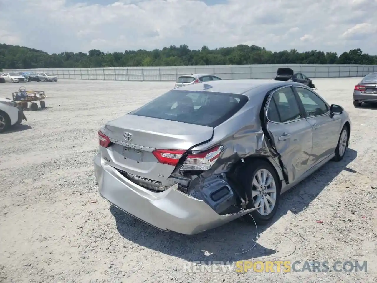 4 Photograph of a damaged car 4T1B11HK5KU715607 TOYOTA CAMRY 2019