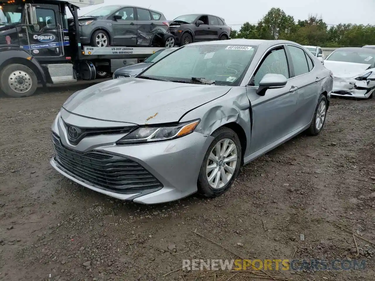 2 Photograph of a damaged car 4T1B11HK5KU715719 TOYOTA CAMRY 2019