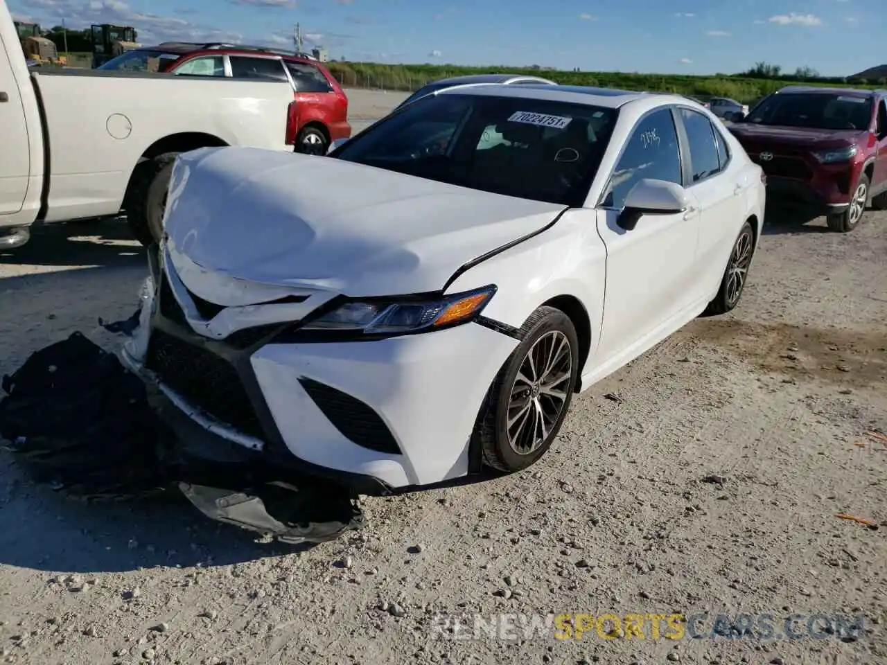 2 Photograph of a damaged car 4T1B11HK5KU721021 TOYOTA CAMRY 2019