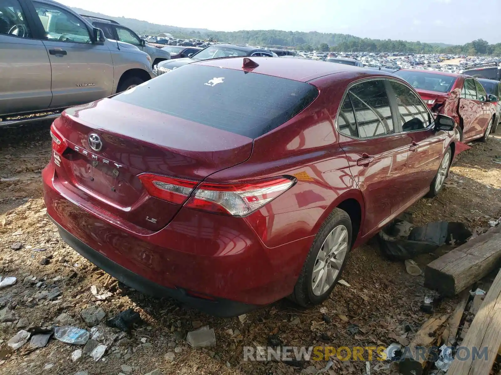 4 Photograph of a damaged car 4T1B11HK5KU721049 TOYOTA CAMRY 2019