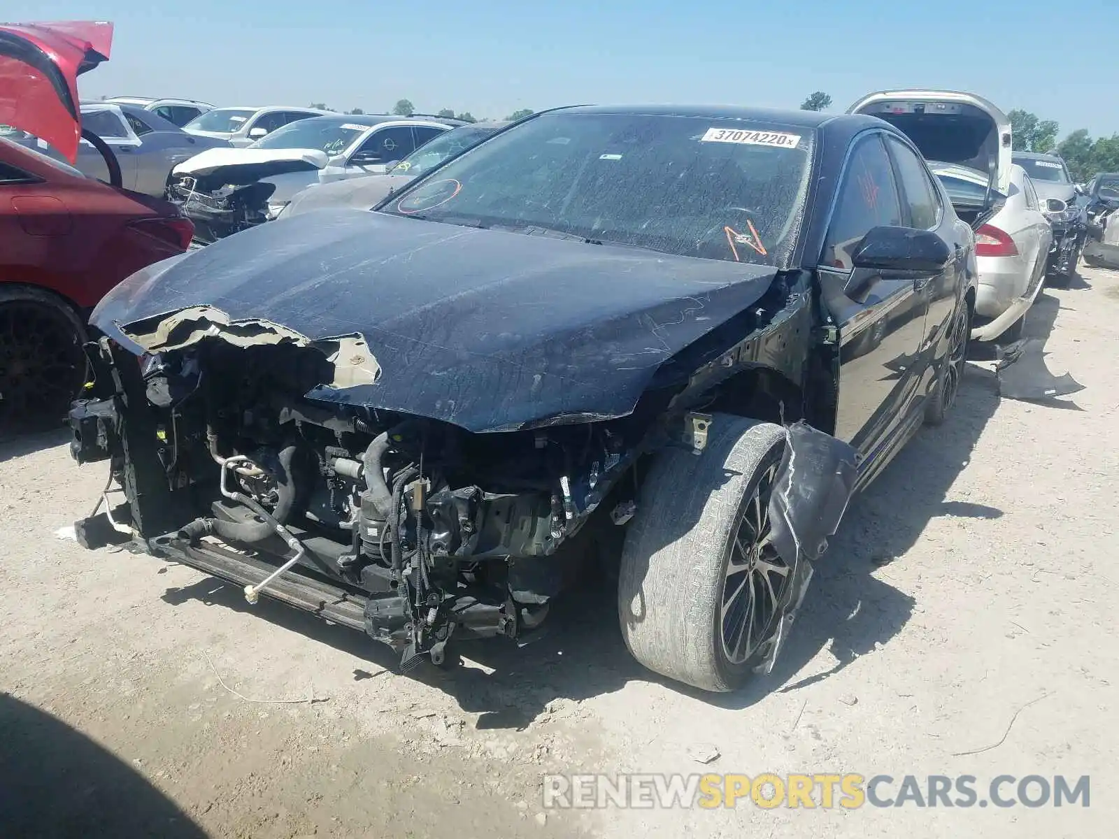 2 Photograph of a damaged car 4T1B11HK5KU721133 TOYOTA CAMRY 2019